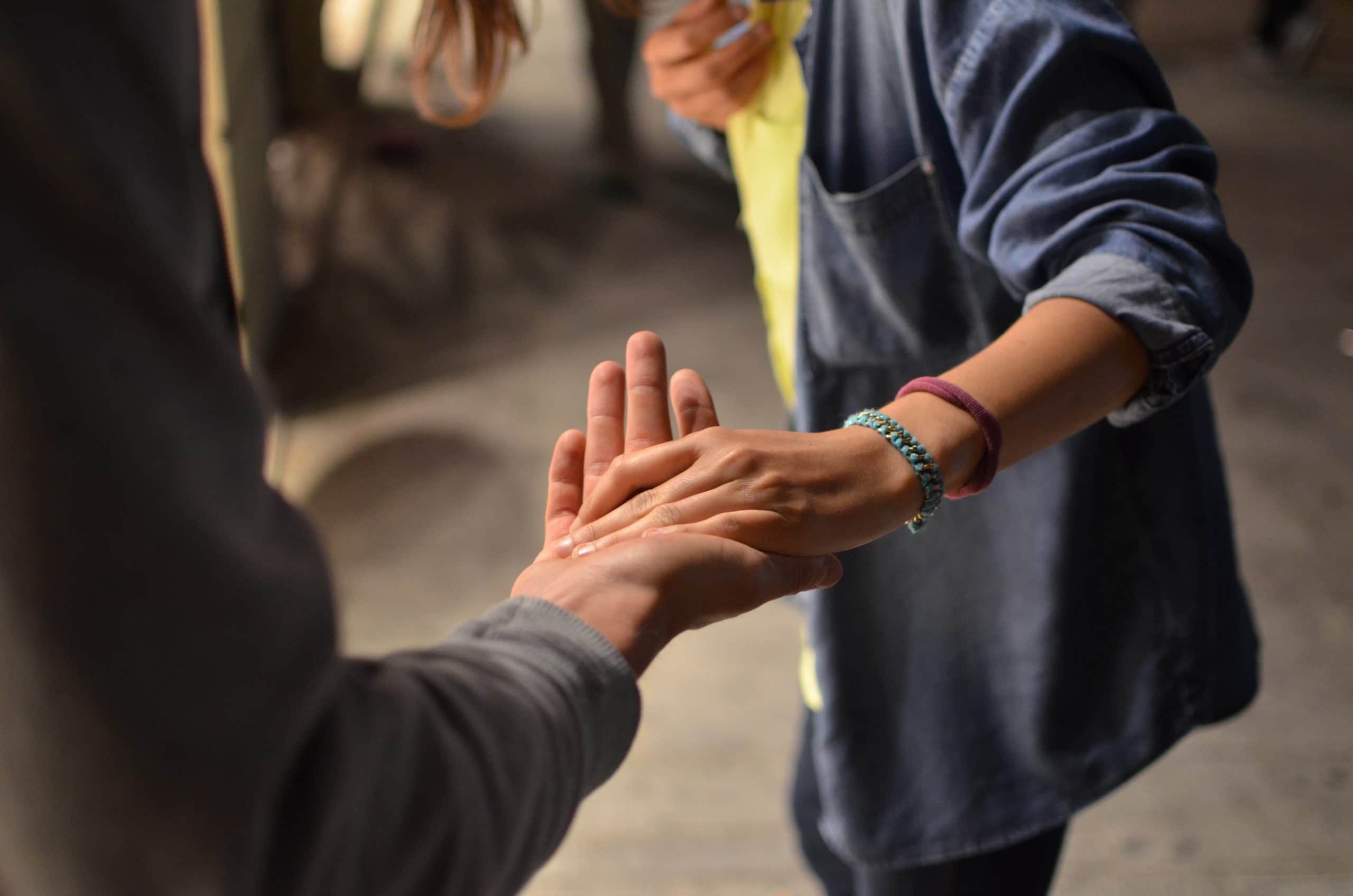 Two hands holding